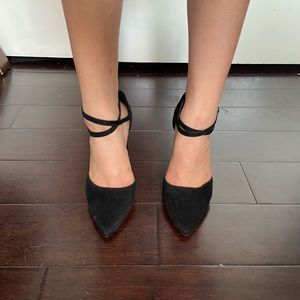 Black crossed heels